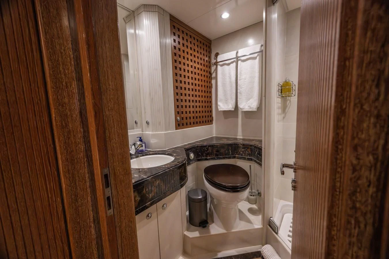 a bathroom with a toilet and sink aboard LA CATTIVA 1 Yacht for Sale