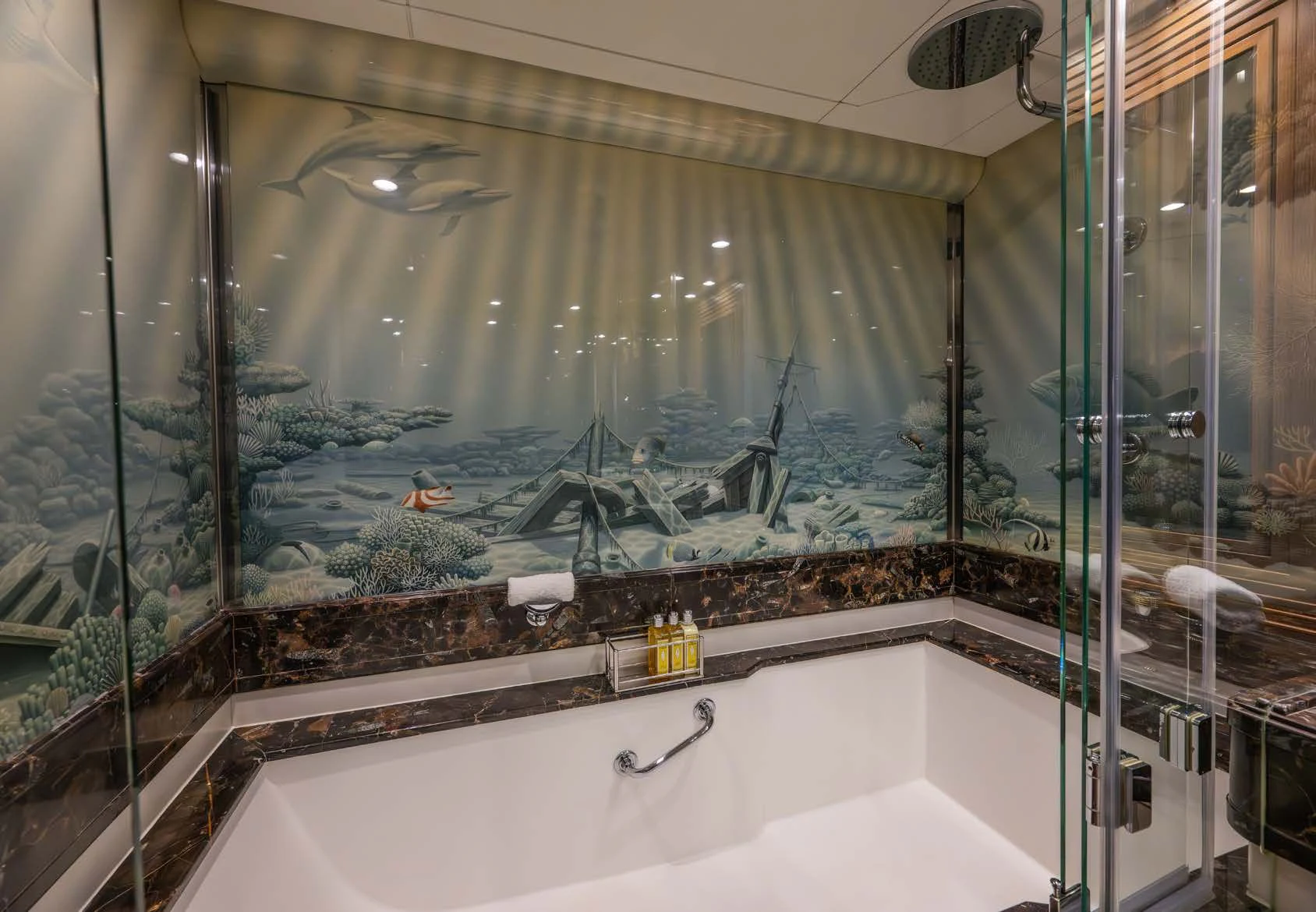a bathroom with a large glass window aboard LA CATTIVA 1 Yacht for Sale