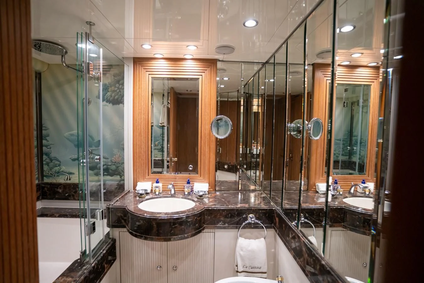 a bathroom with a glass shower aboard LA CATTIVA 1 Yacht for Sale