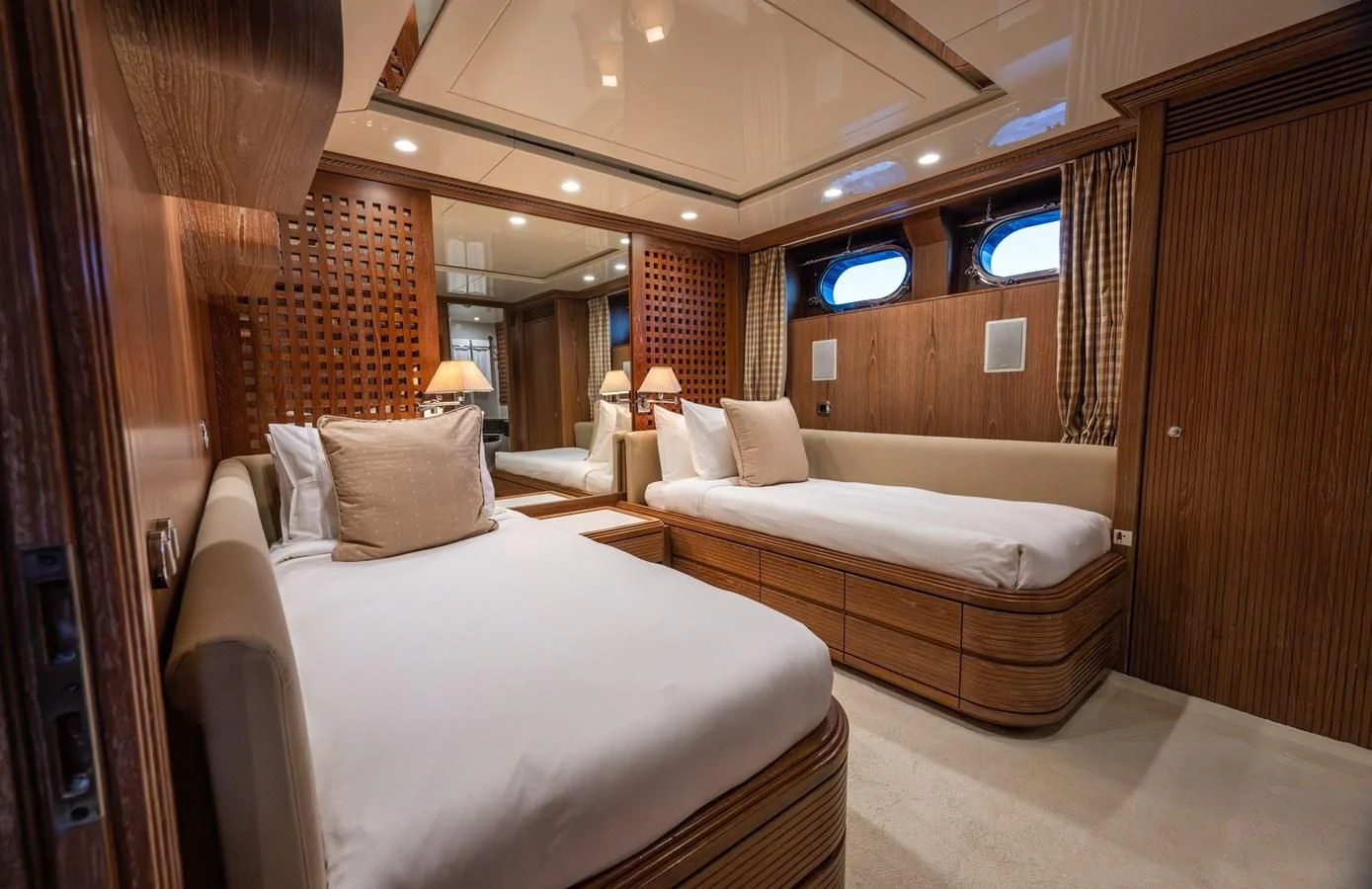 a room with a couple of beds aboard LA CATTIVA 1 Yacht for Sale