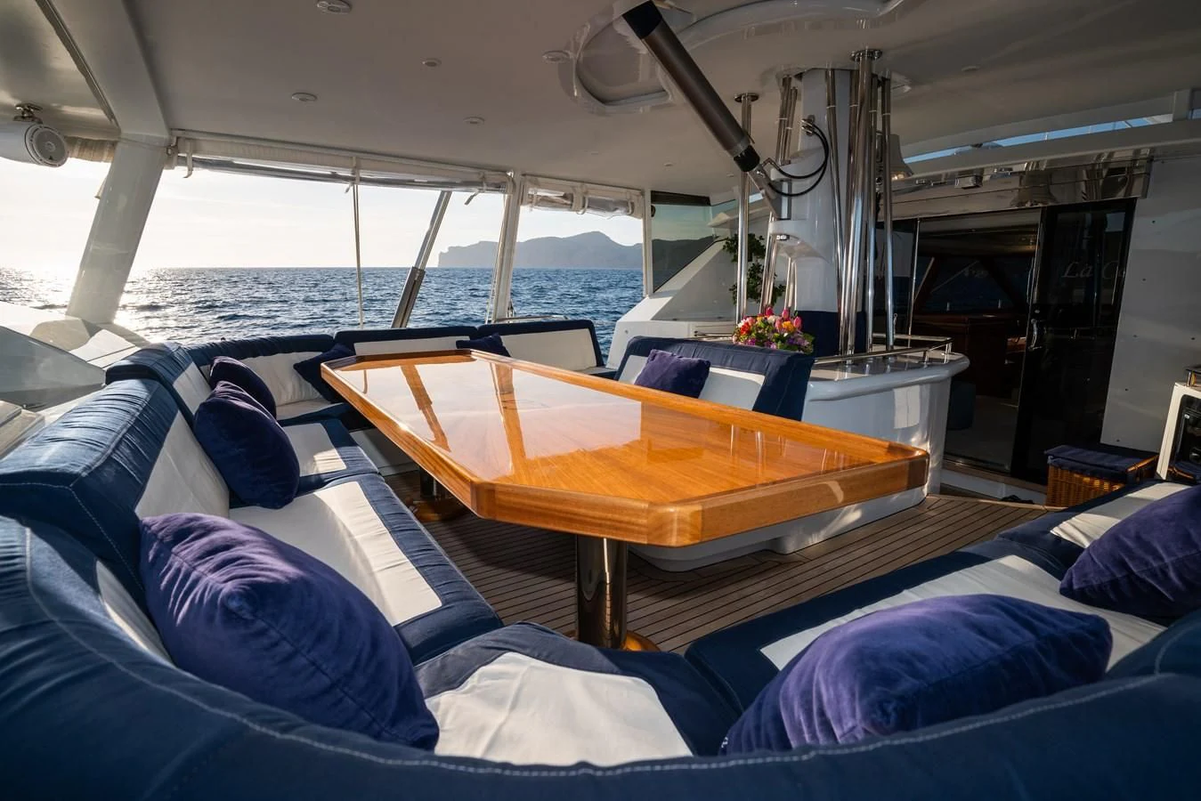 a boat with a table and chairs aboard LA CATTIVA 1 Yacht for Sale