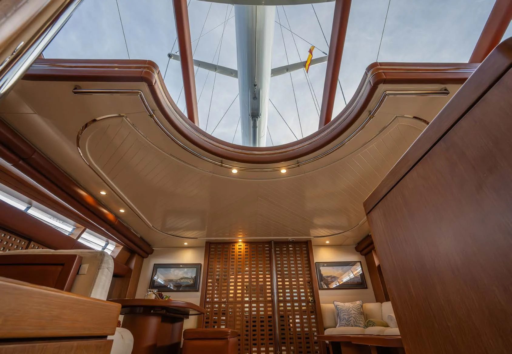a room with wooden walls and a wood floor and a large window aboard LA CATTIVA 1 Yacht for Sale