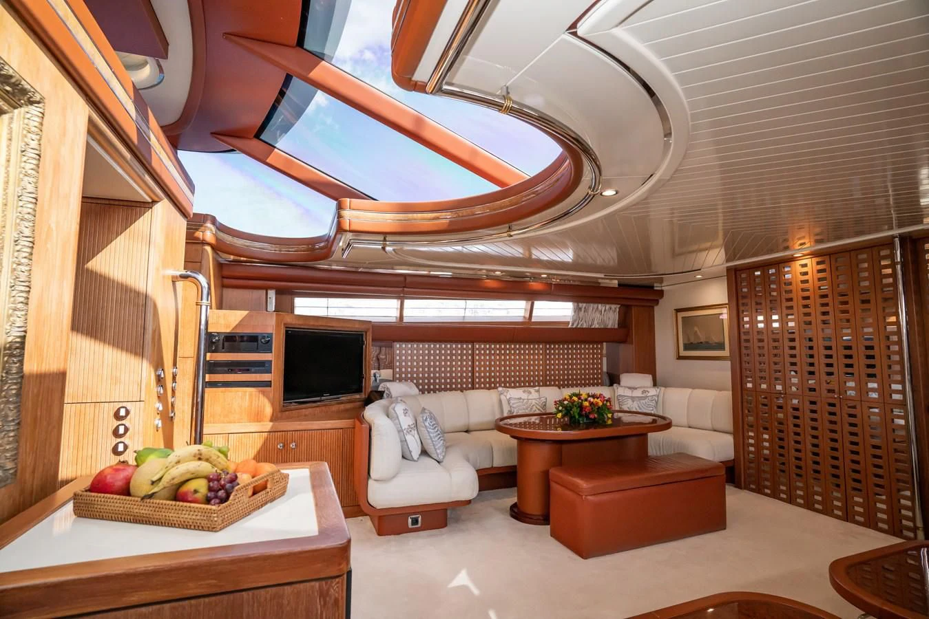a living room with a large ceiling aboard LA CATTIVA 1 Yacht for Sale