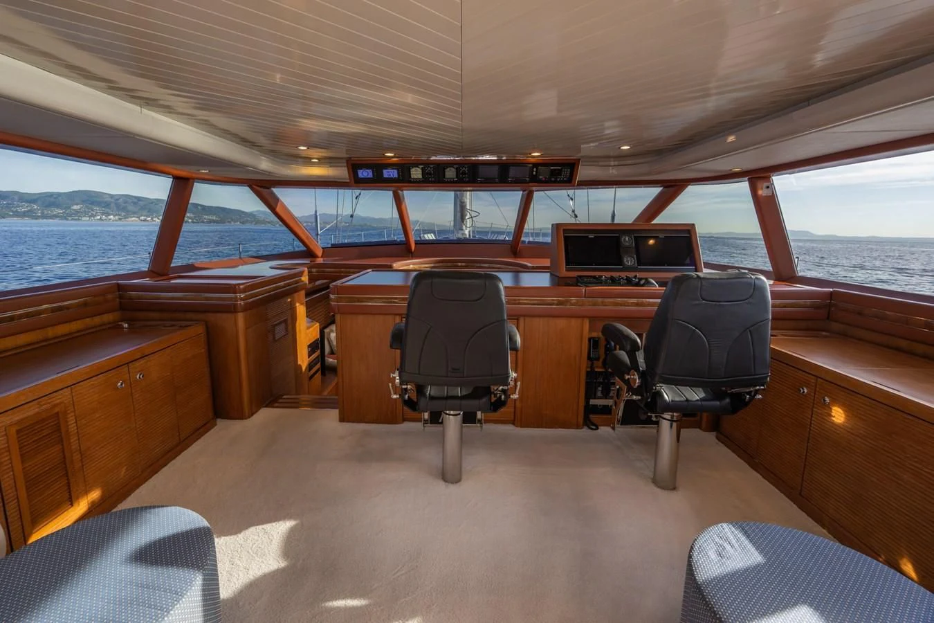 a boat with a desk and chairs aboard LA CATTIVA 1 Yacht for Sale