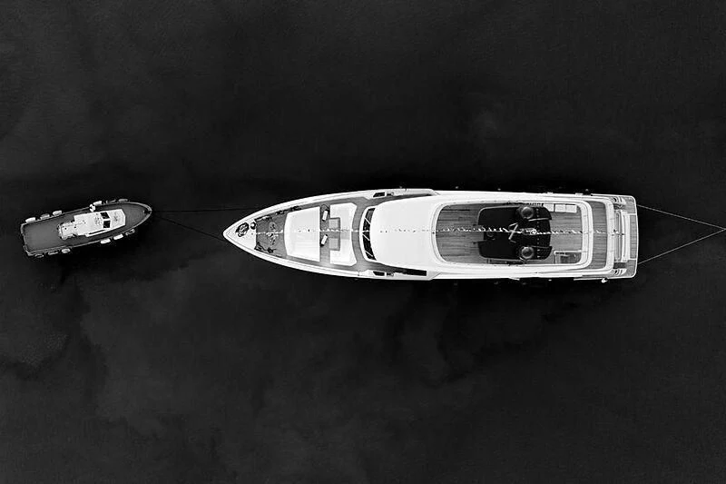 a pair of silver and black watches aboard JOANNA B Yacht for Sale