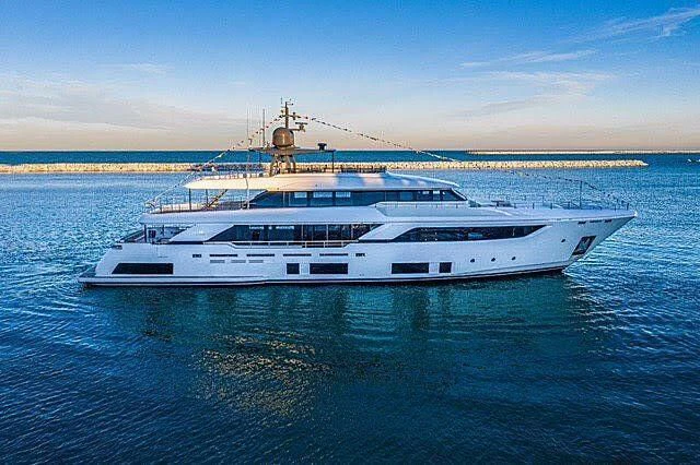 a white yacht in the water aboard JOANNA B Yacht for Sale