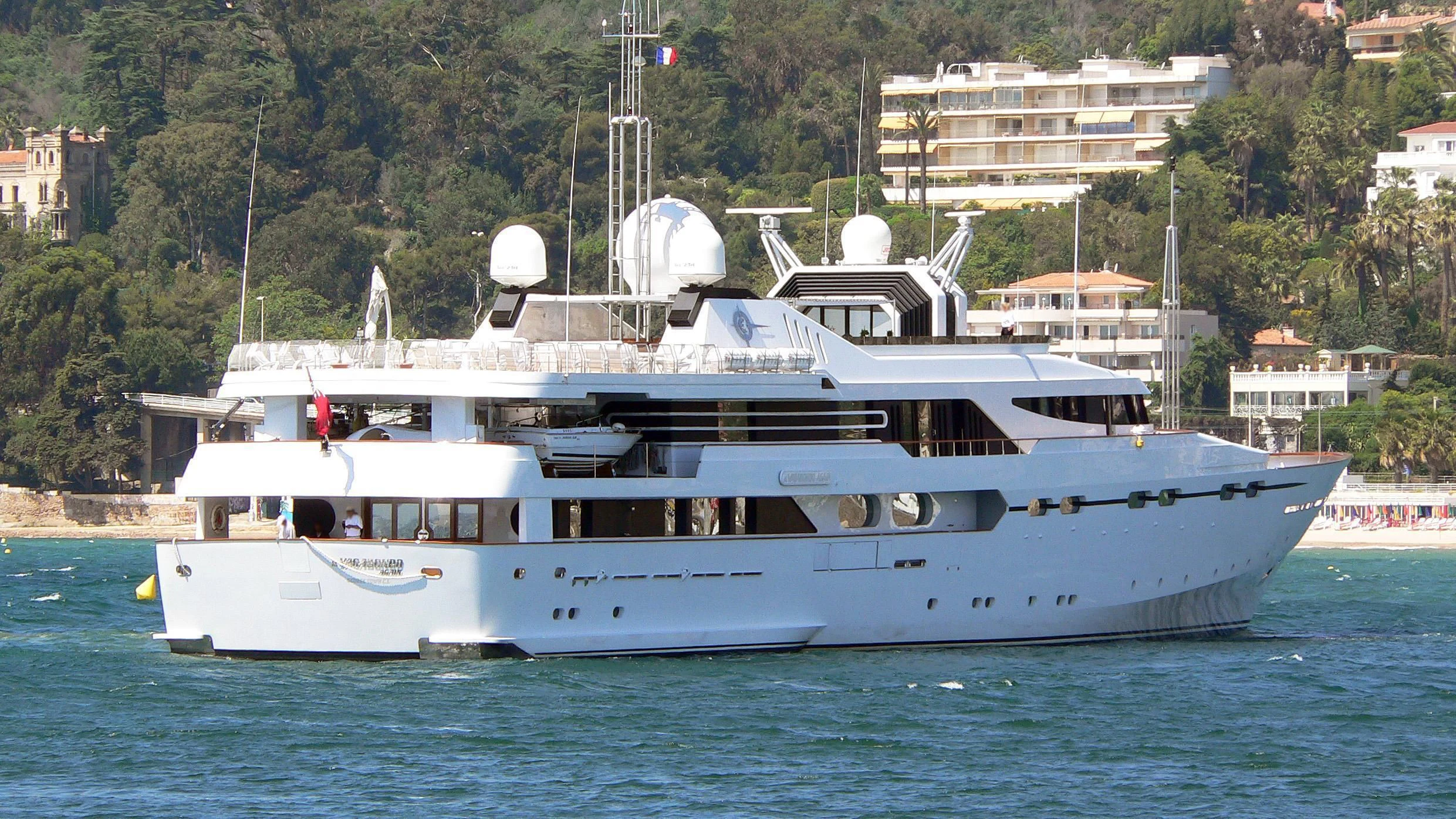 a large white boat in the water aboard IL VAGABONDO Yacht for Sale