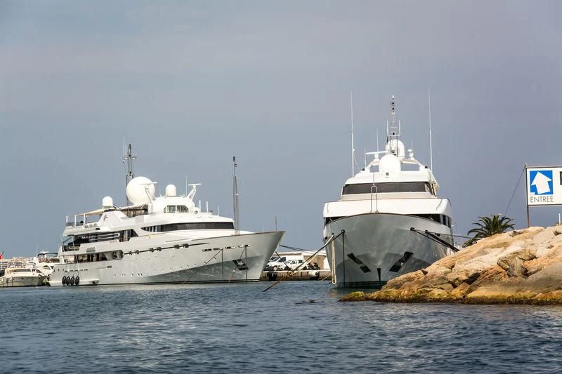 a couple of boats in the water aboard IL VAGABONDO Yacht for Sale