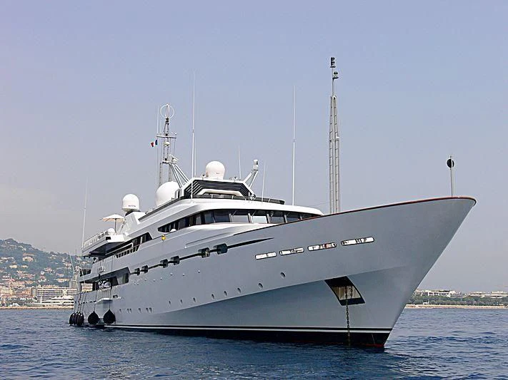 a large white boat in the water aboard IL VAGABONDO Yacht for Sale