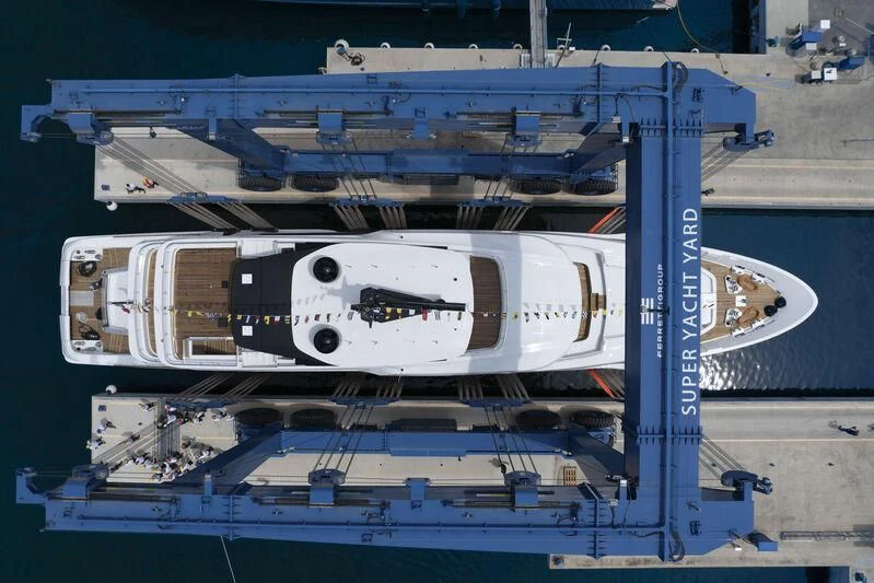 a white and blue boat aboard ASANTE Yacht for Sale
