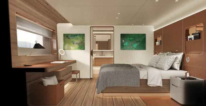 a room with a bed and a desk aboard ASANTE Yacht for Sale