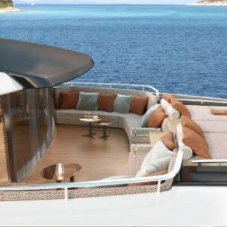 a lounge chair on a beach aboard ASANTE Yacht for Sale
