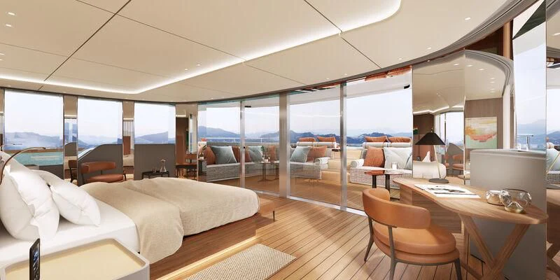 a room with a bed and a table and chairs aboard ASANTE Yacht for Sale