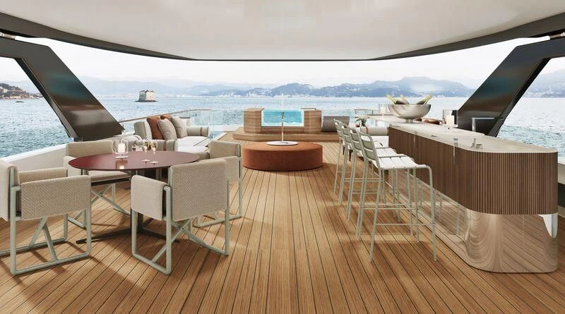 a wooden deck overlooking a body of water aboard ASANTE Yacht for Sale