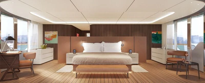 a bedroom with a bed and desk aboard ASANTE Yacht for Sale
