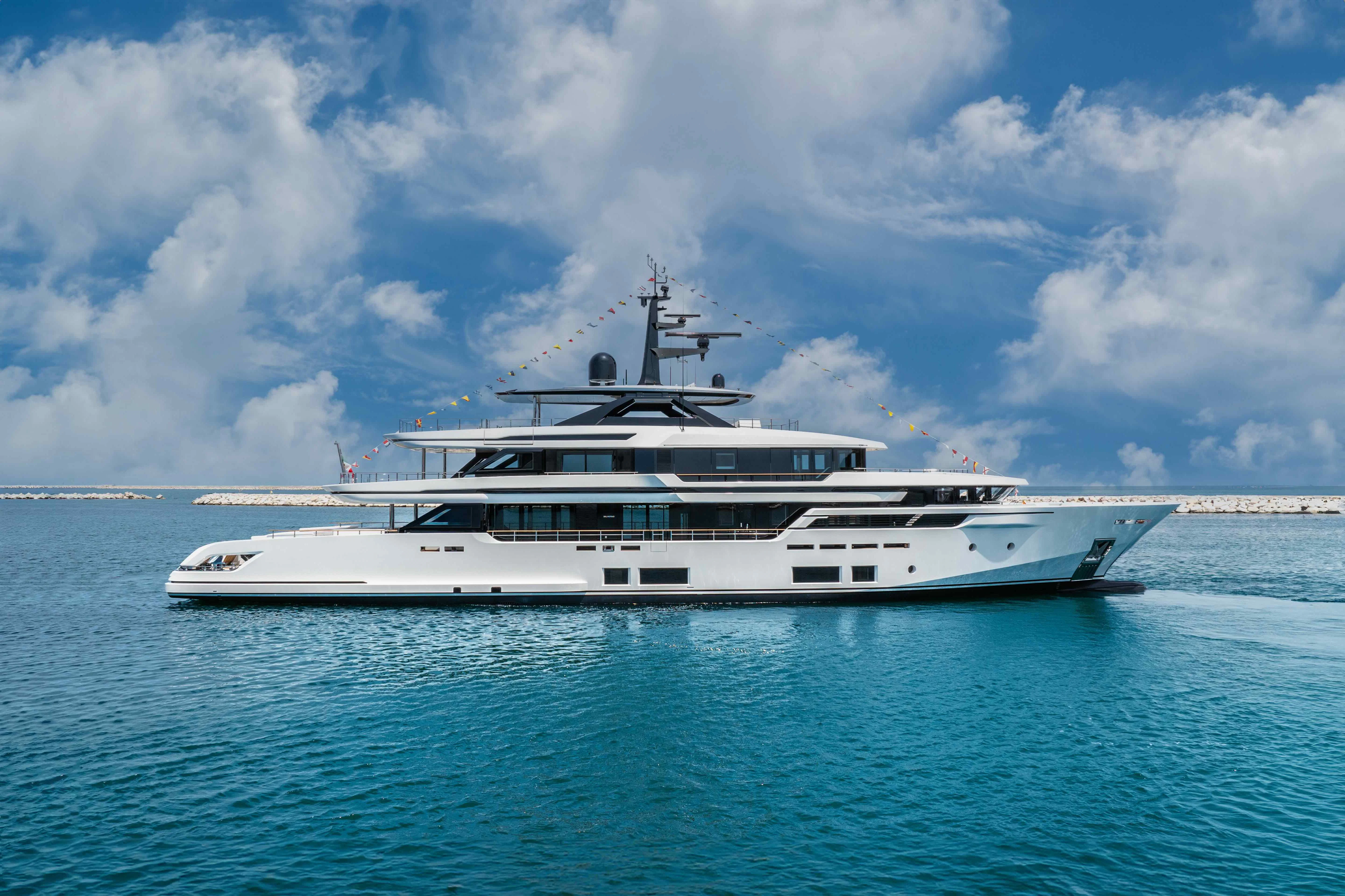 a white yacht in the water aboard ASANTE Yacht for Sale