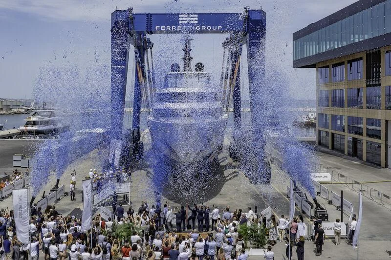a large crowd of people around a large statue aboard ASANTE Yacht for Sale