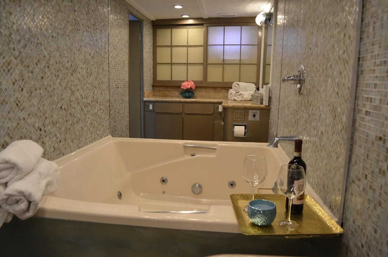 a bathroom with a bathtub and a sink aboard ISABELLA Yacht for Sale