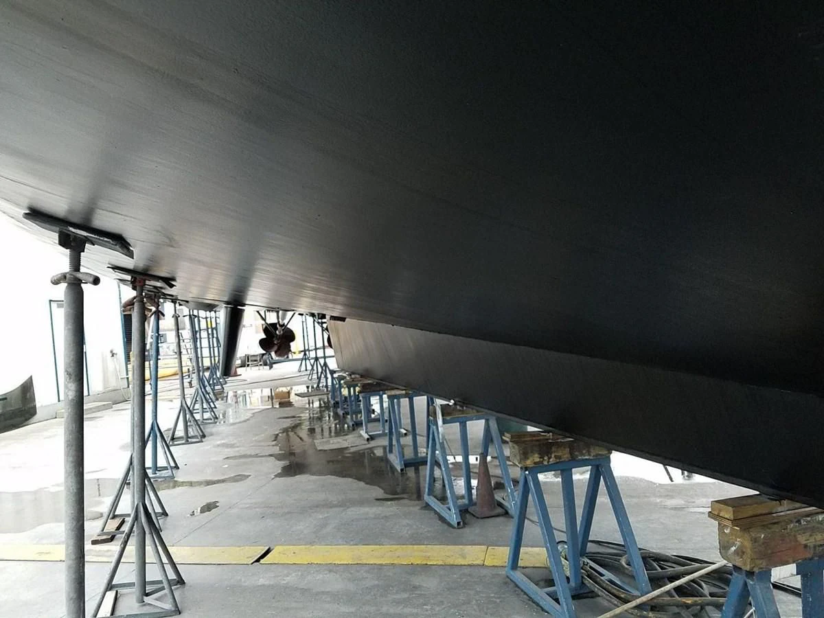 a person working on a large machine aboard ISABELLA Yacht for Sale