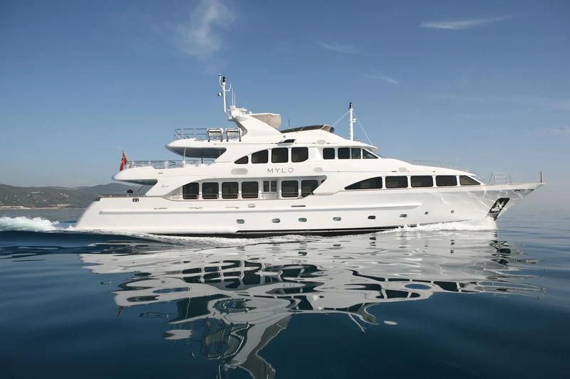 a white boat on the water aboard FRISH Yacht for Sale