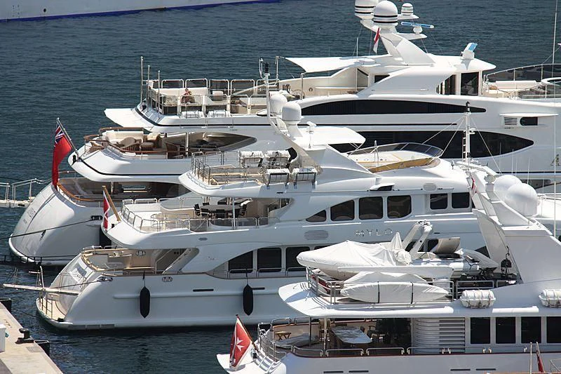 a group of white yachts aboard FRISH Yacht for Sale