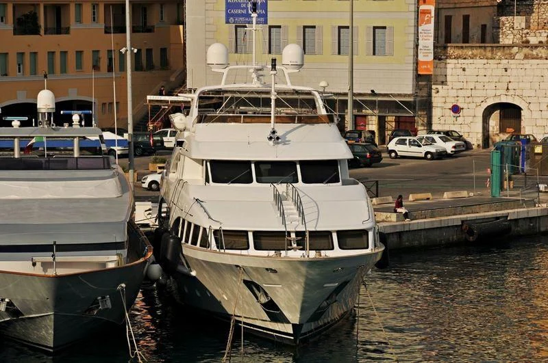 boats are parked near the water aboard FRISH Yacht for Sale