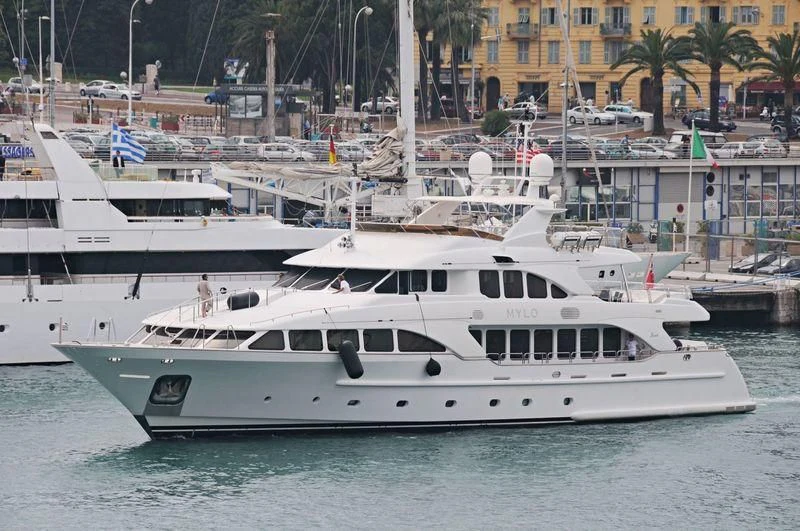 a couple of white yachts in the water aboard FRISH Yacht for Sale