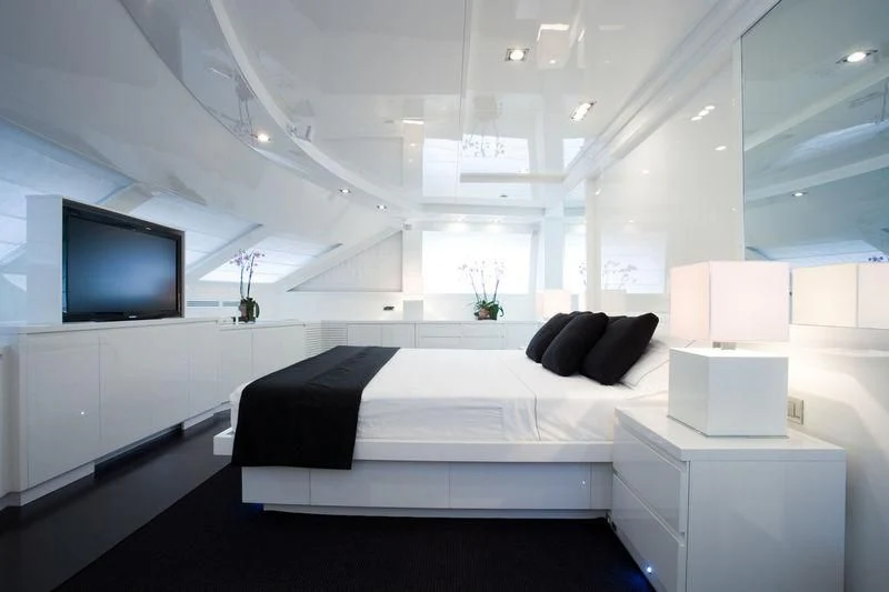 a room with a bed and a tv aboard FRISH Yacht for Sale