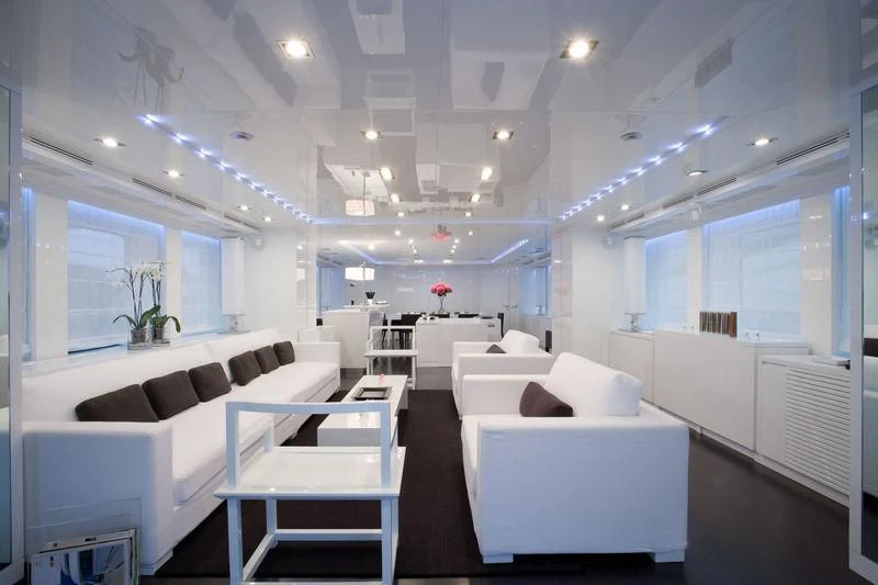 a room with white couches aboard FRISH Yacht for Sale