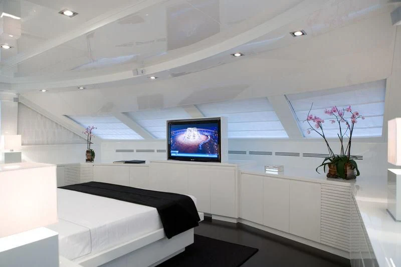 a room with a tv and a bed aboard FRISH Yacht for Sale