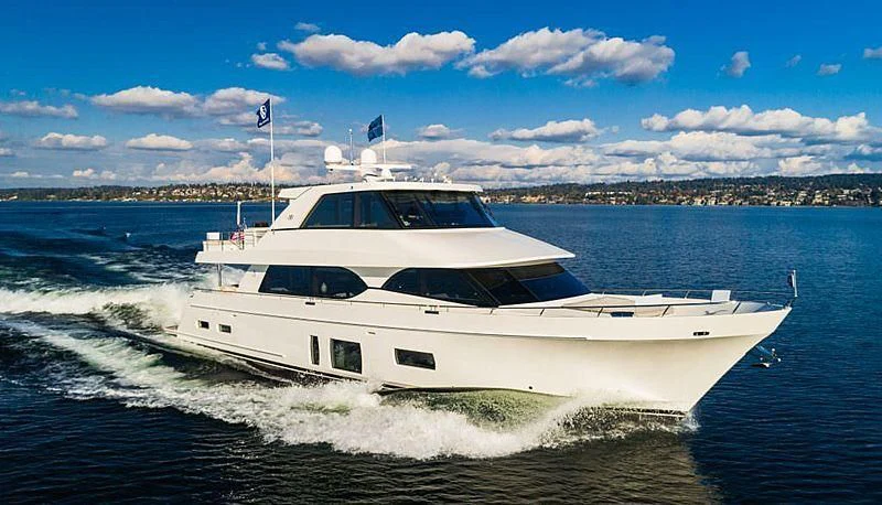 a white yacht on the water aboard VARIABLE Yacht for Sale