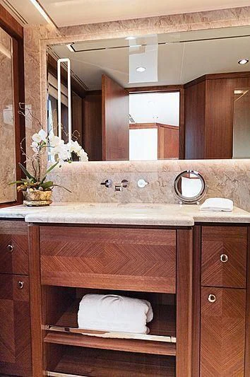 a bathroom with a large mirror aboard VARIABLE Yacht for Sale