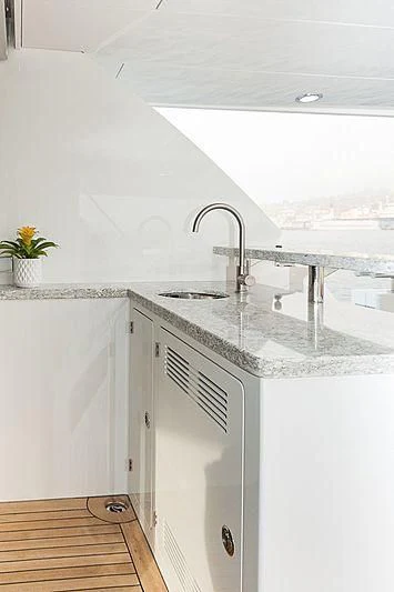 a kitchen with a sink and a large faucet aboard VARIABLE Yacht for Sale