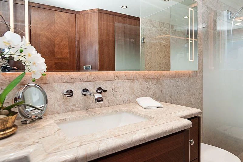 a bathroom with a large mirror aboard VARIABLE Yacht for Sale