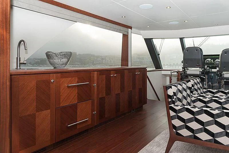a kitchen with a large window aboard VARIABLE Yacht for Sale