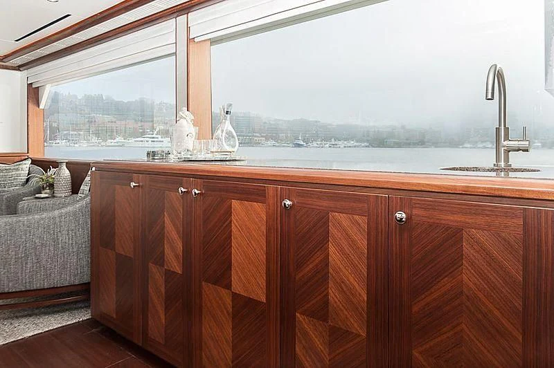 a kitchen with a sink and a window aboard VARIABLE Yacht for Sale