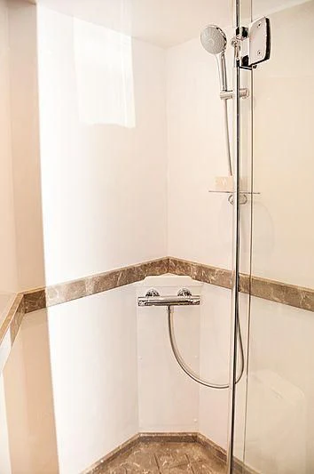 a shower with a metal handle aboard VARIABLE Yacht for Sale