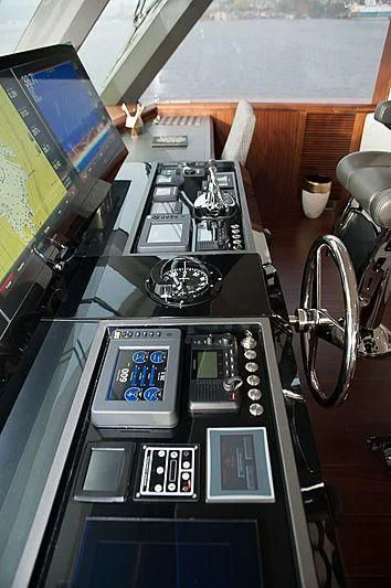 a black control panel with buttons and a screen aboard VARIABLE Yacht for Sale