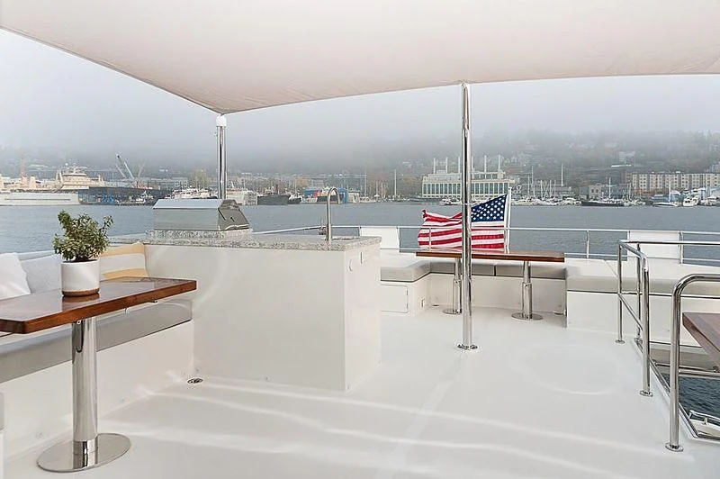 a flag on a table aboard VARIABLE Yacht for Sale