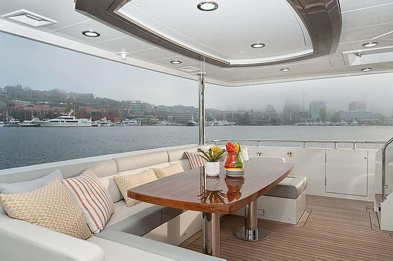 a table with a drink on it aboard VARIABLE Yacht for Sale