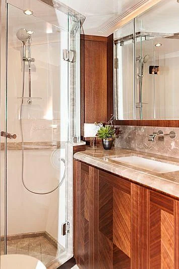 a bathroom with a shower and sink aboard VARIABLE Yacht for Sale