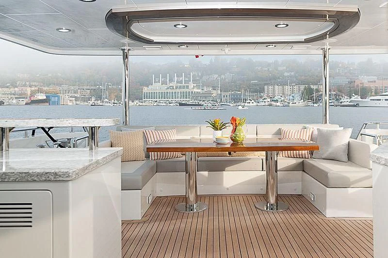 a room with a table and chairs aboard VARIABLE Yacht for Sale