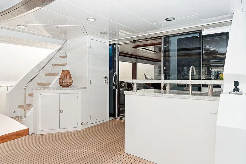 a room with a large white counter and cabinets aboard VARIABLE Yacht for Sale
