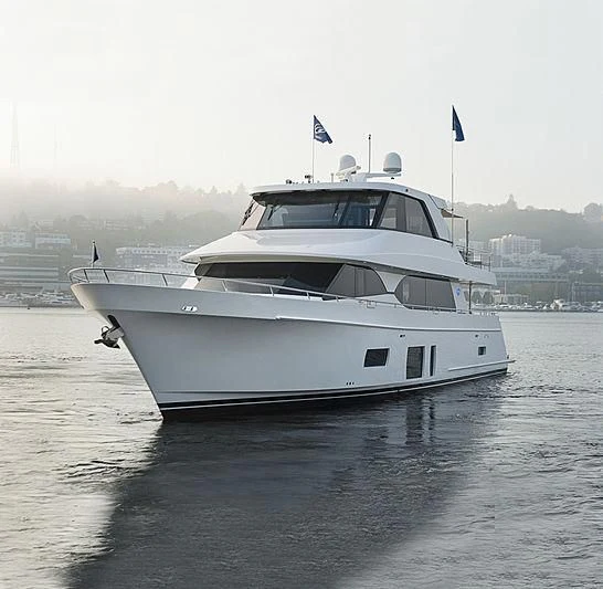 a white boat in the water aboard VARIABLE Yacht for Sale
