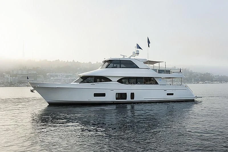 a white yacht on the water aboard VARIABLE Yacht for Sale