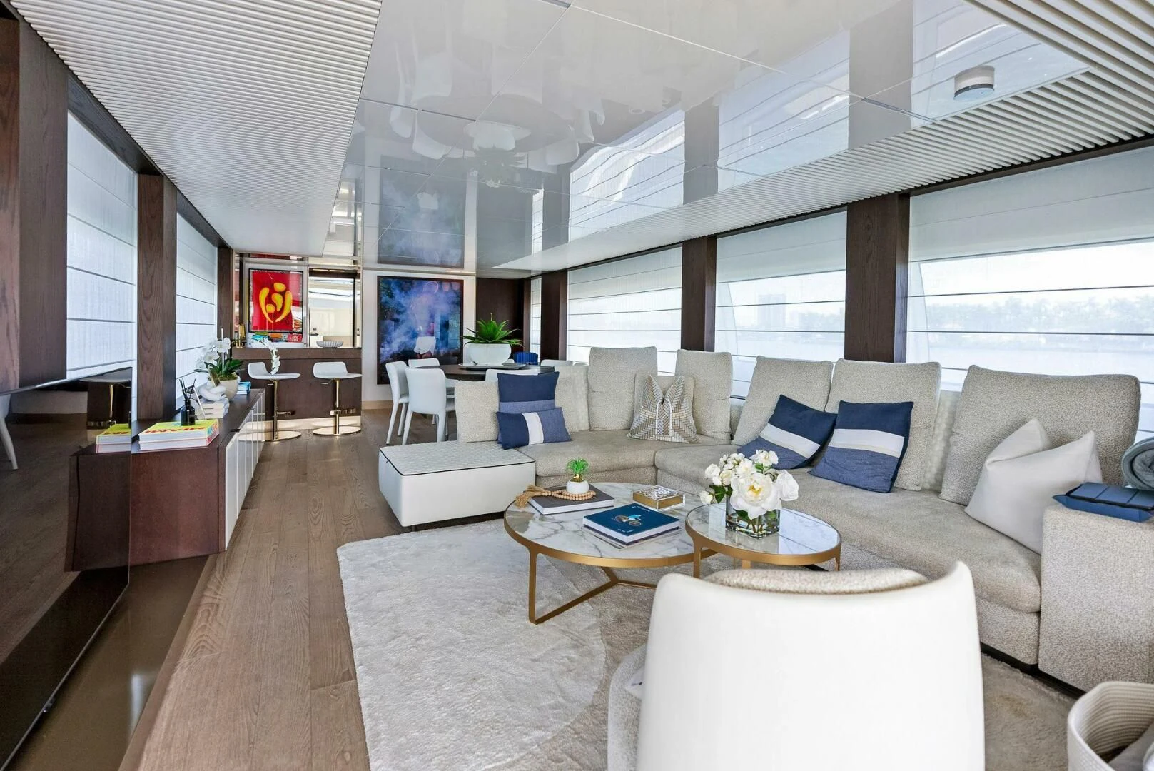a living room with a couch and a coffee table aboard INEA Yacht for Sale