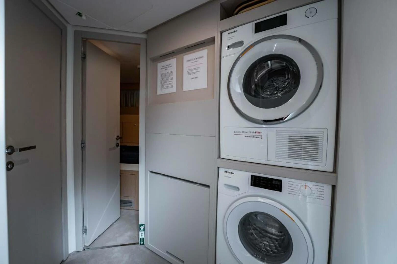 a washing machine in a room aboard INEA Yacht for Sale