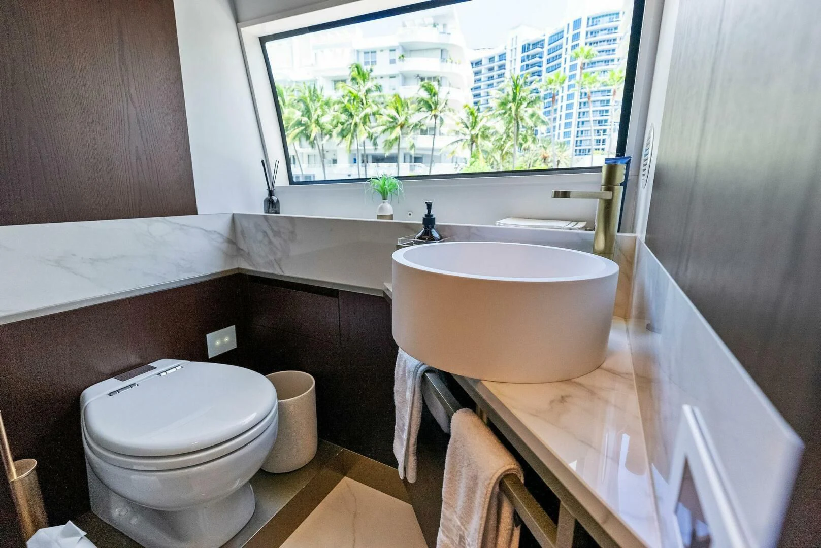 a bathroom with a tub sink and toilet aboard INEA Yacht for Sale