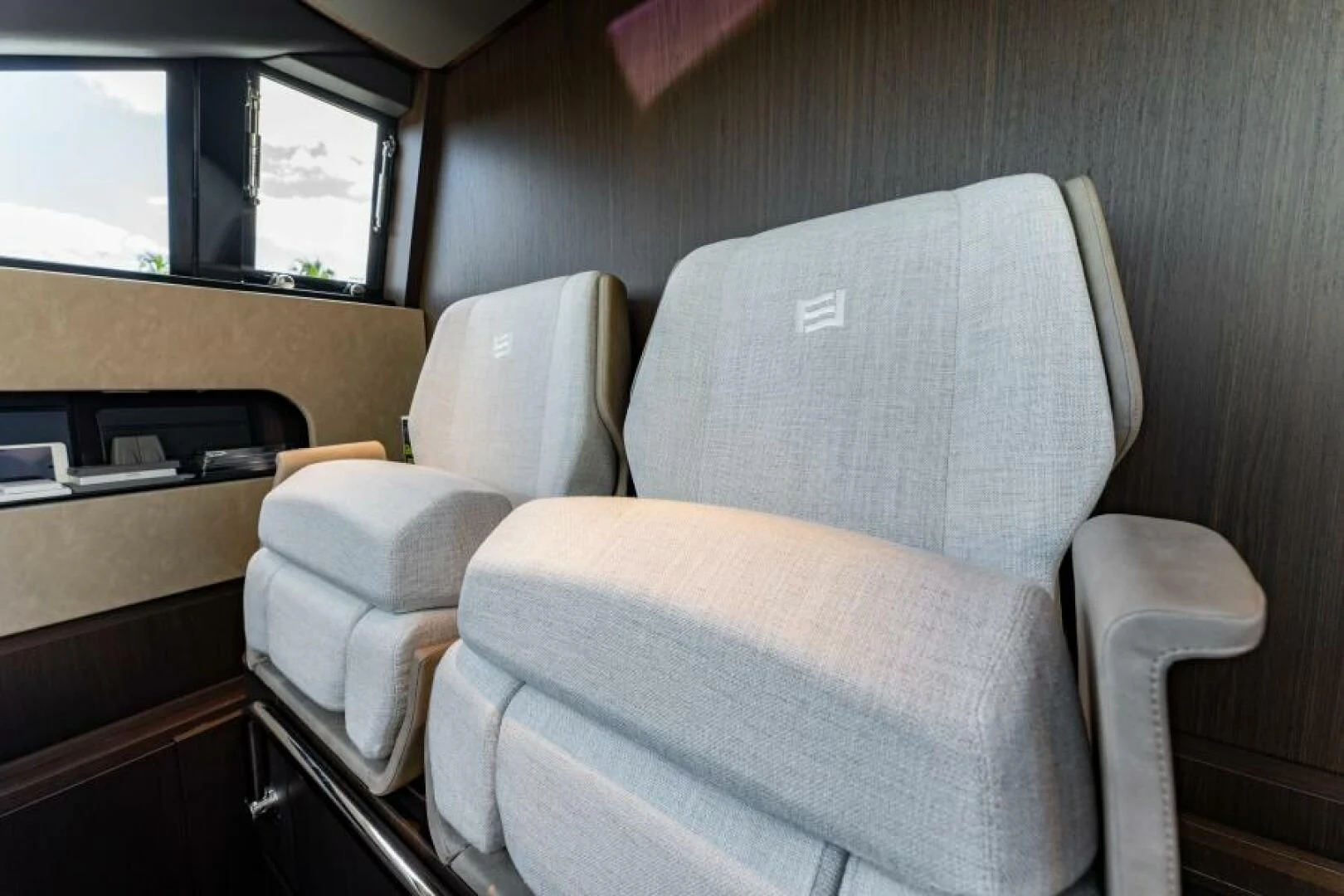 a couple of chairs in a room aboard INEA Yacht for Sale