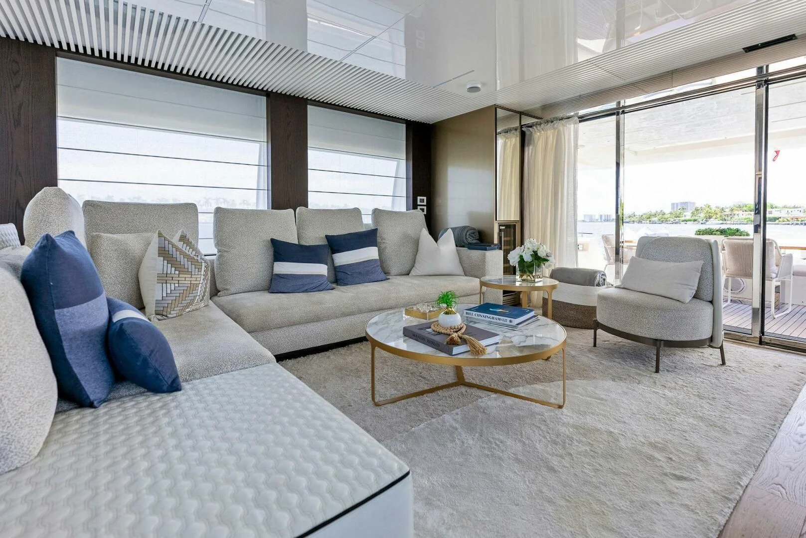 a living room with a large window aboard INEA Yacht for Sale